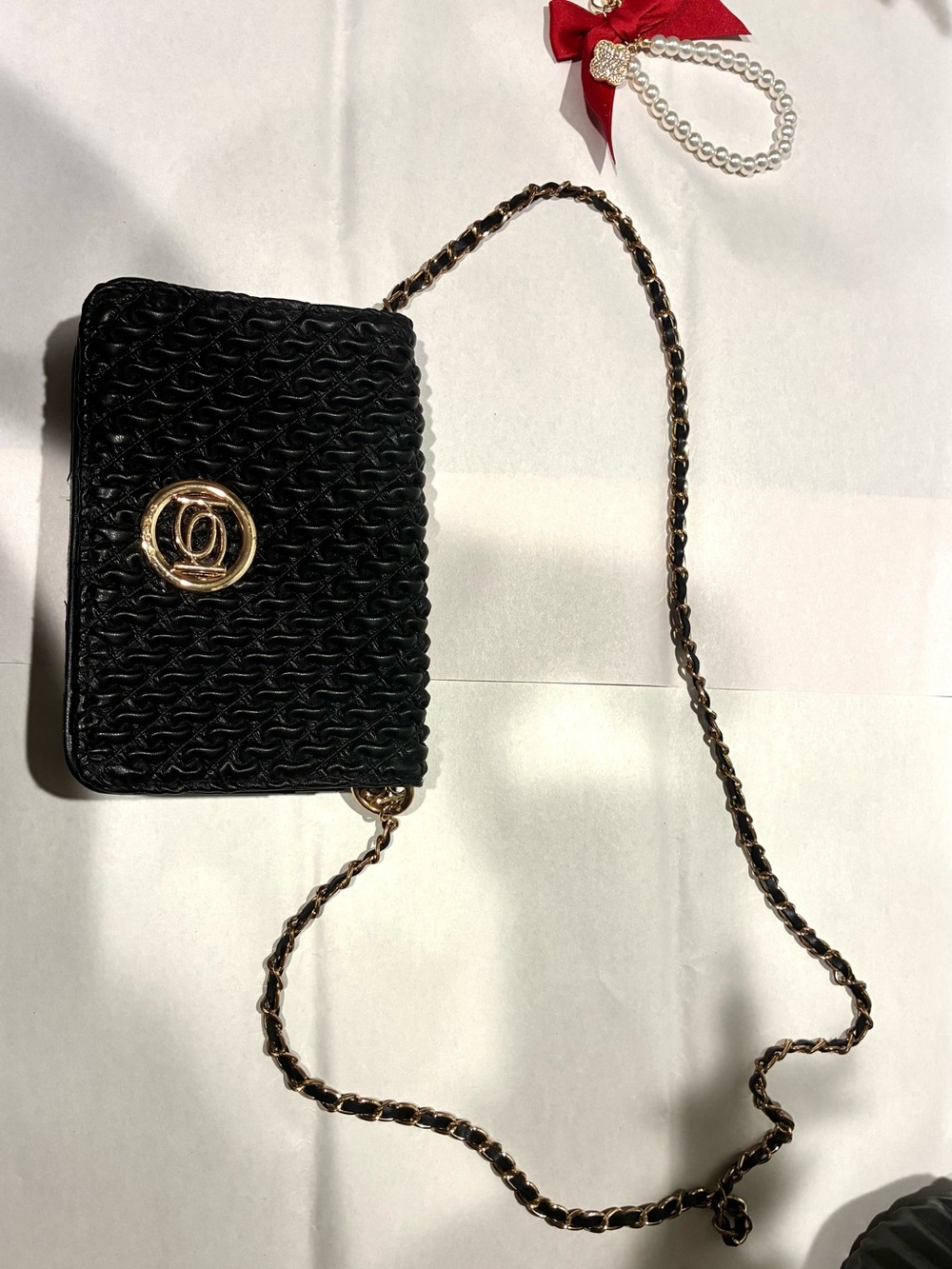 bebe Black Quilted Crossbody with Gold-Tone Chain and Emblem